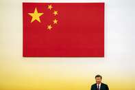 China’s Xi Swears-In New Hong Kong Leader After Crackdown