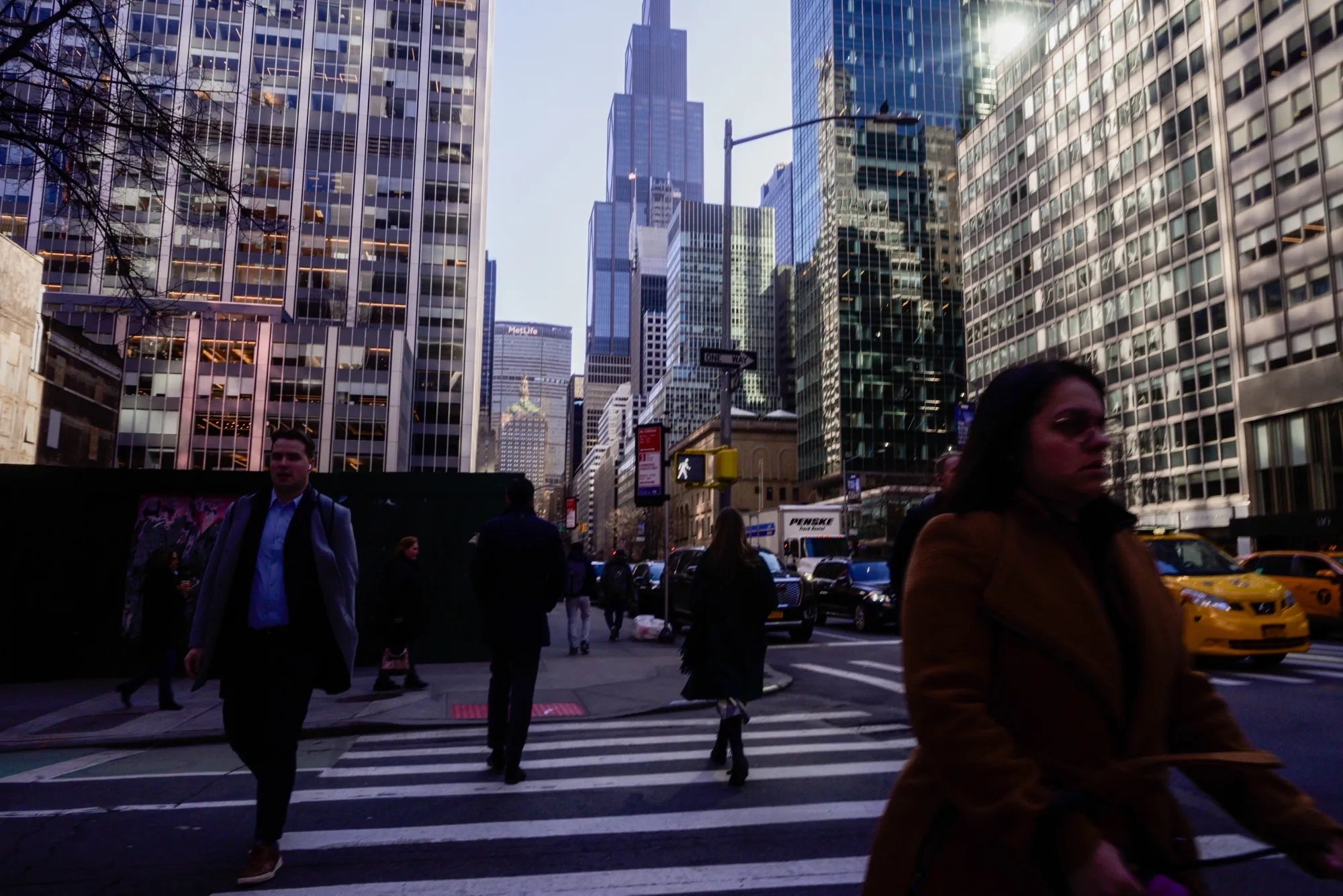 Pedestrians on Park Avenue in the Plaza District of New York.