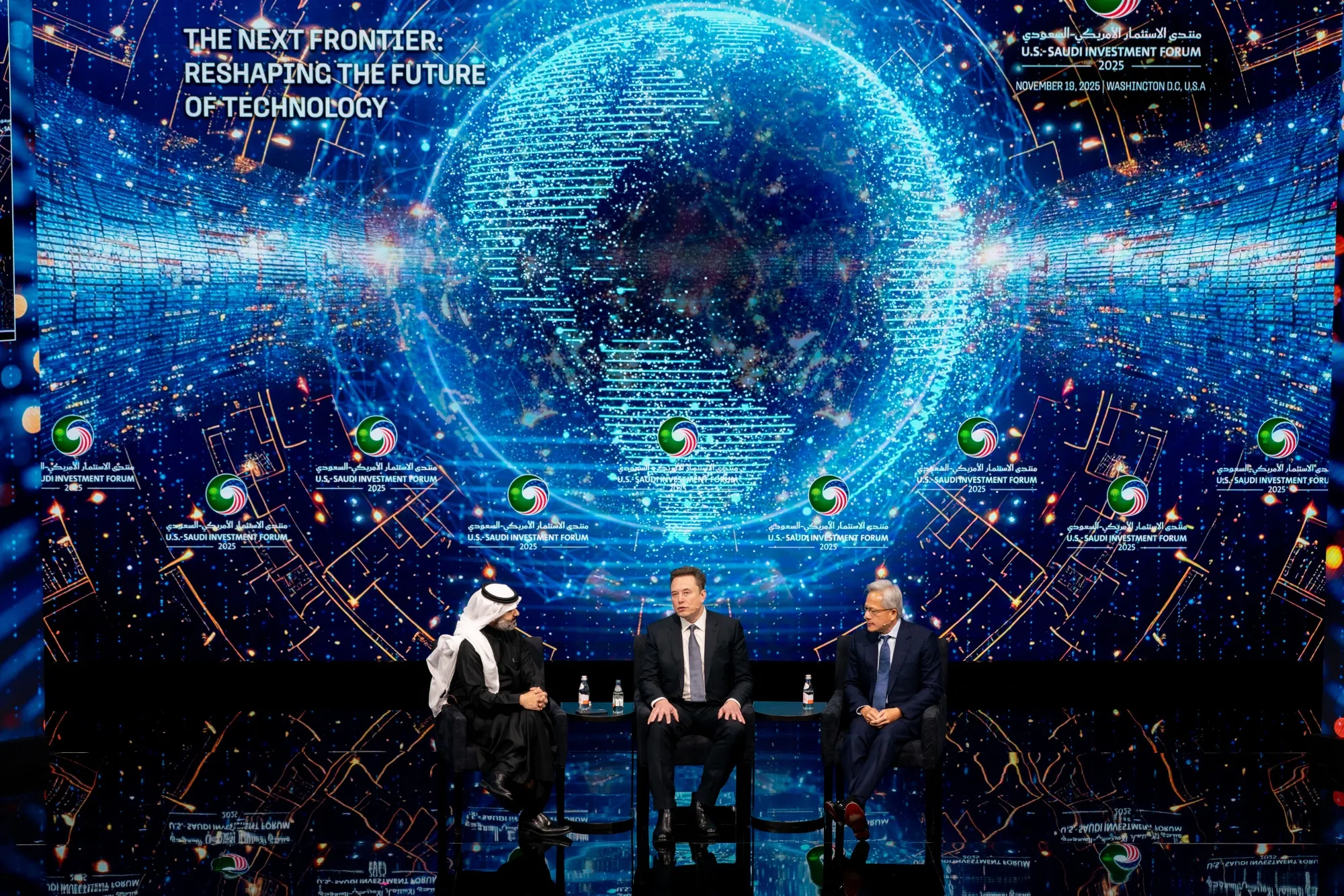 Elon Musk, center, at the US-Saudi Investment Forum on Nov. 19.