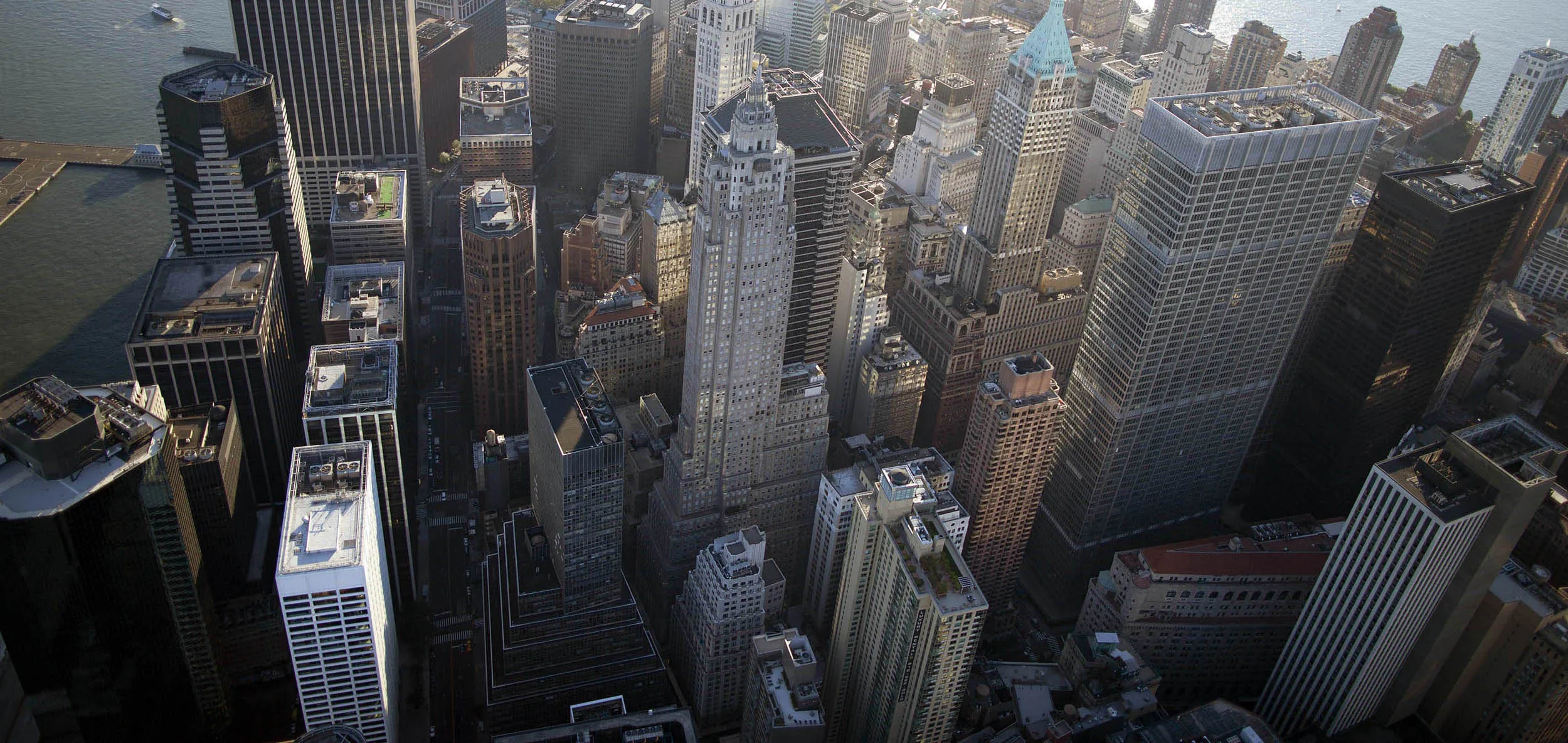 Commercial and residential buildings stand in the financial district of Manhattan.