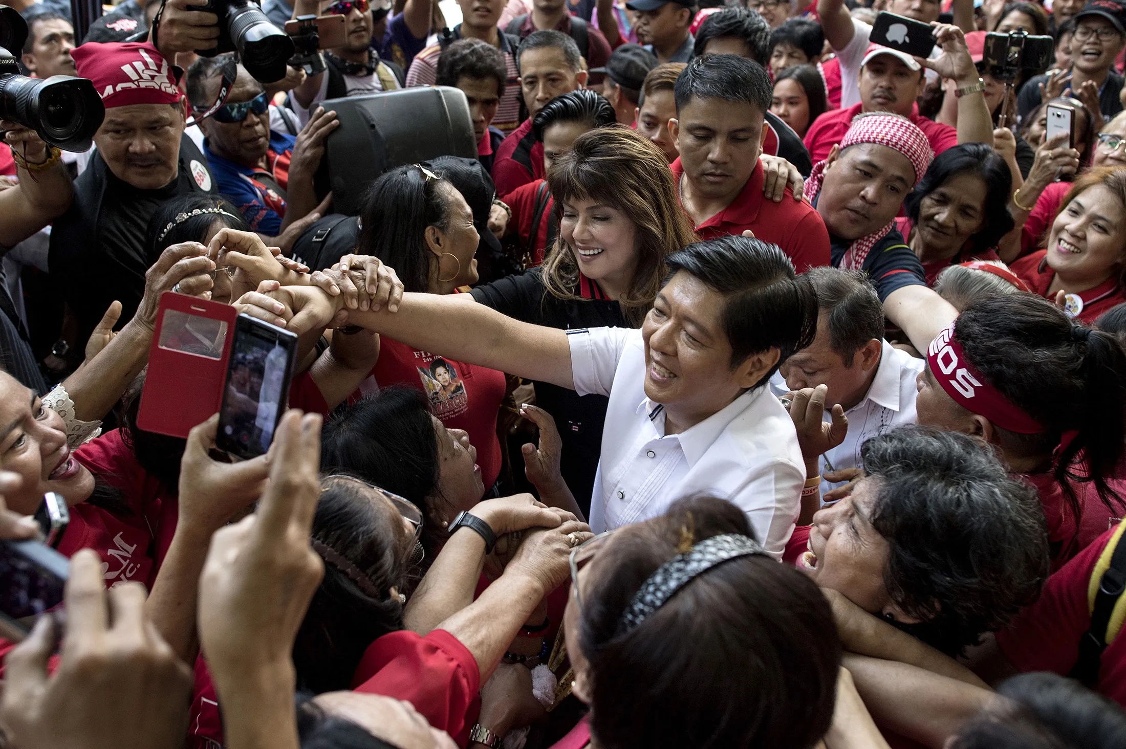Ferdinand “Bongbong” Marcos Jr, center, in Manila, in 2018.