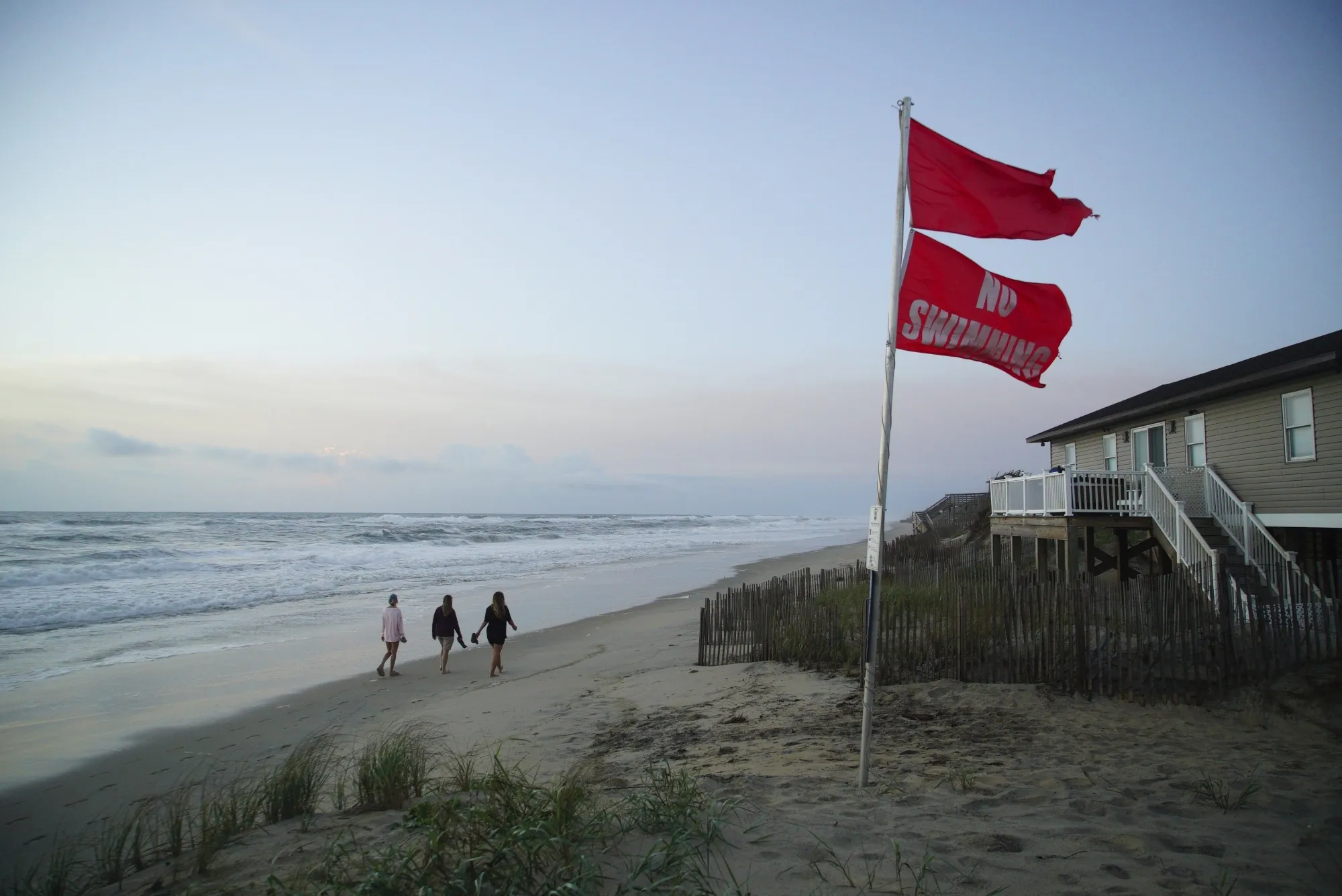 A no swimming flag near&nbsp;waves caused by Hurricane Erin in Nags Head, North Carolina on August 20.