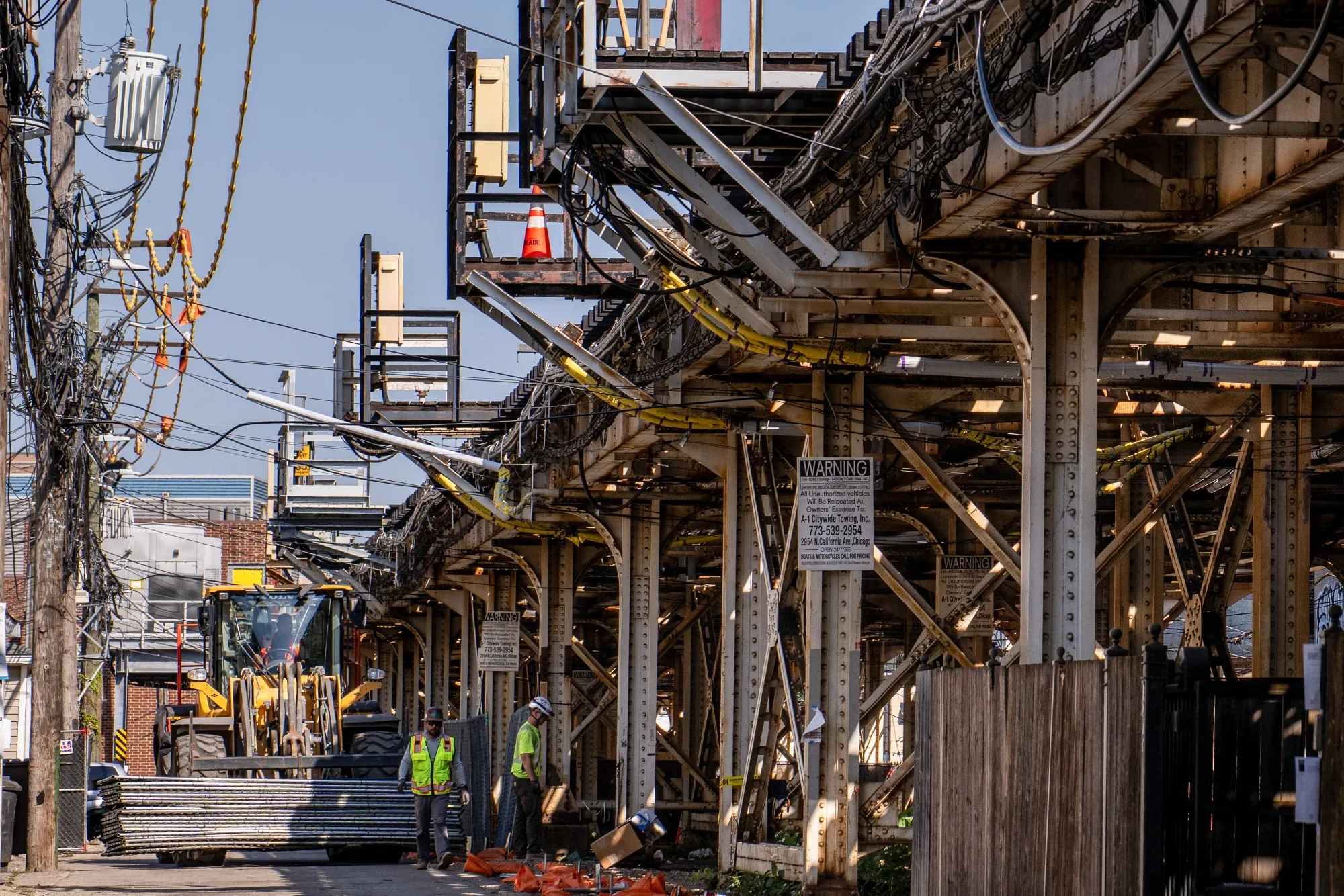 Workers next to tracks for the CTA red line during construction&nbsp;in Chicago.