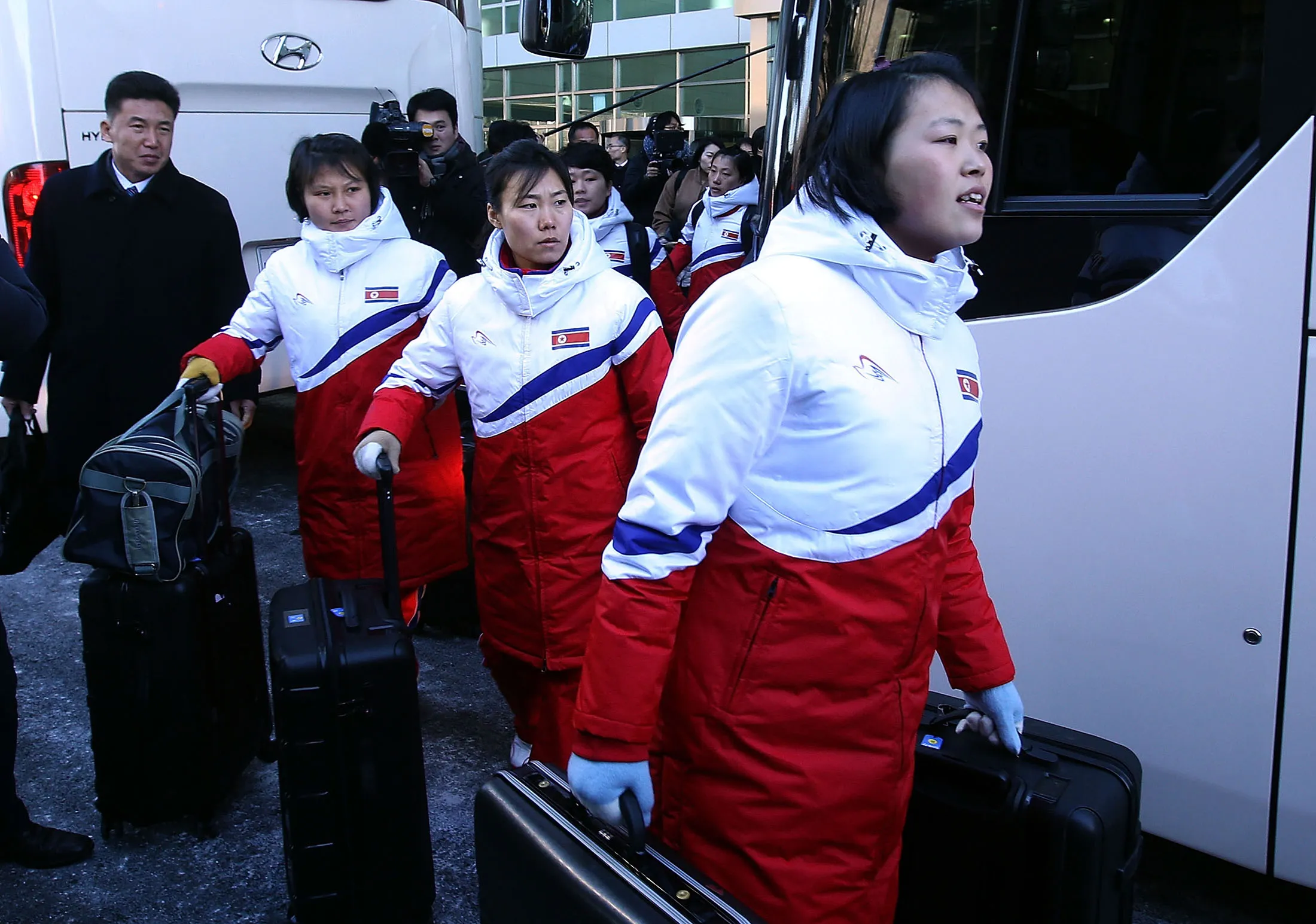 North Korean women's ice hockey players arrive at the CIQ (Customs, Immigration and Quarantine) office near the demilitarized zone in Paju on Jan.&nbsp;25.