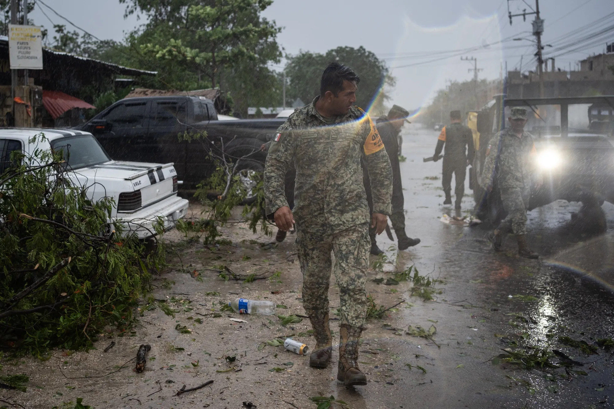 Members of the Mexican Army conduct sweeps after Hurricane Beryl made landfall in Tulum, Mexico, on July 5, 2024.