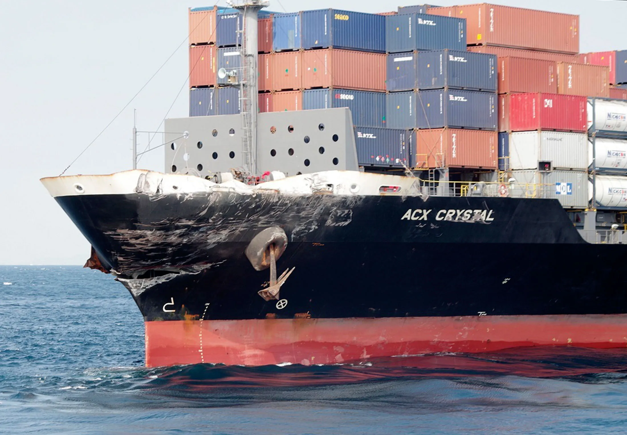 CX Crystal is seen in the waters off Izu Peninsula, southwest of Tokyo, after it had collided with the USS Fitzgerald, June 17.
