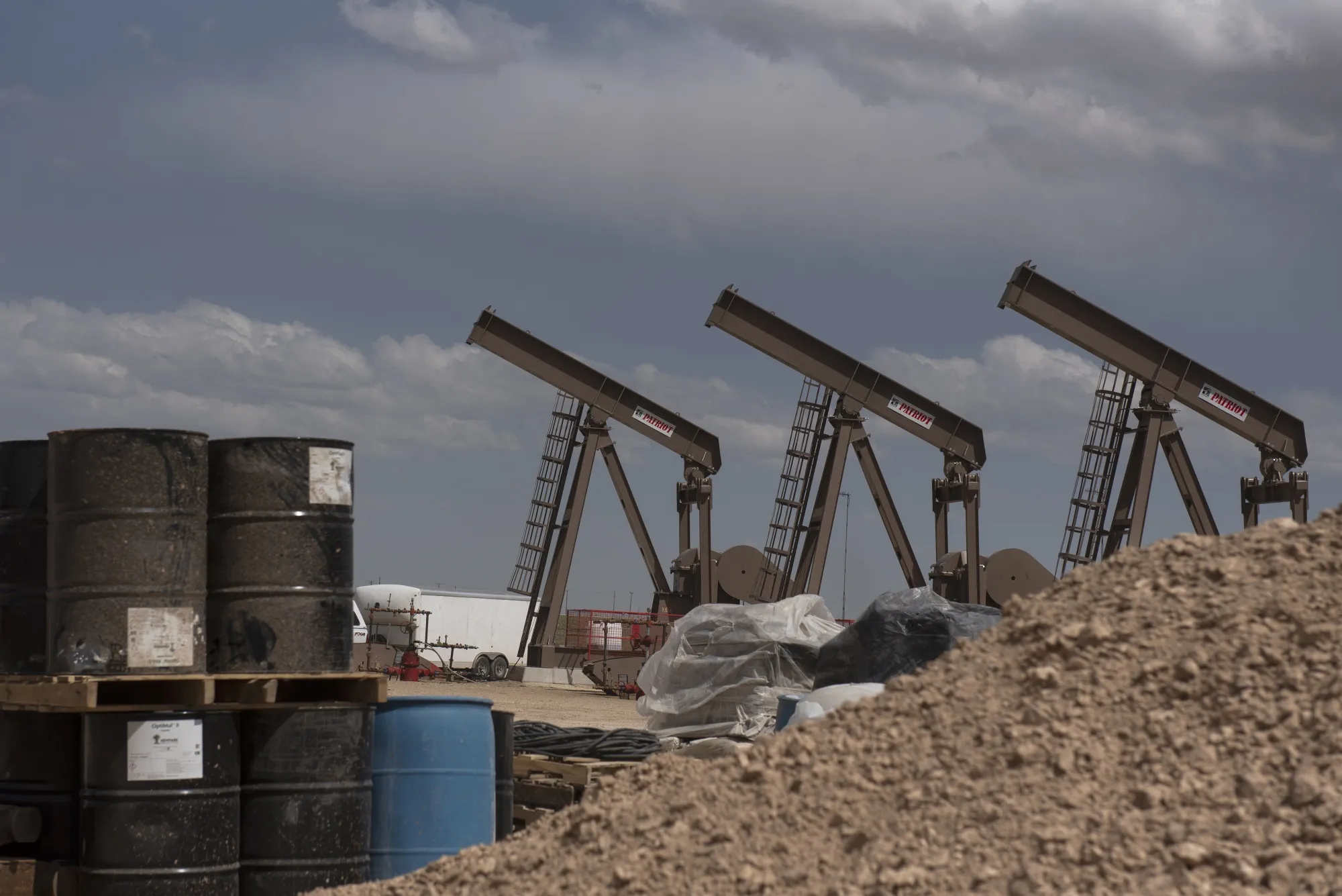 A row of pumpjacks at a Diamondback Energy oil rig in Midland, Texas.