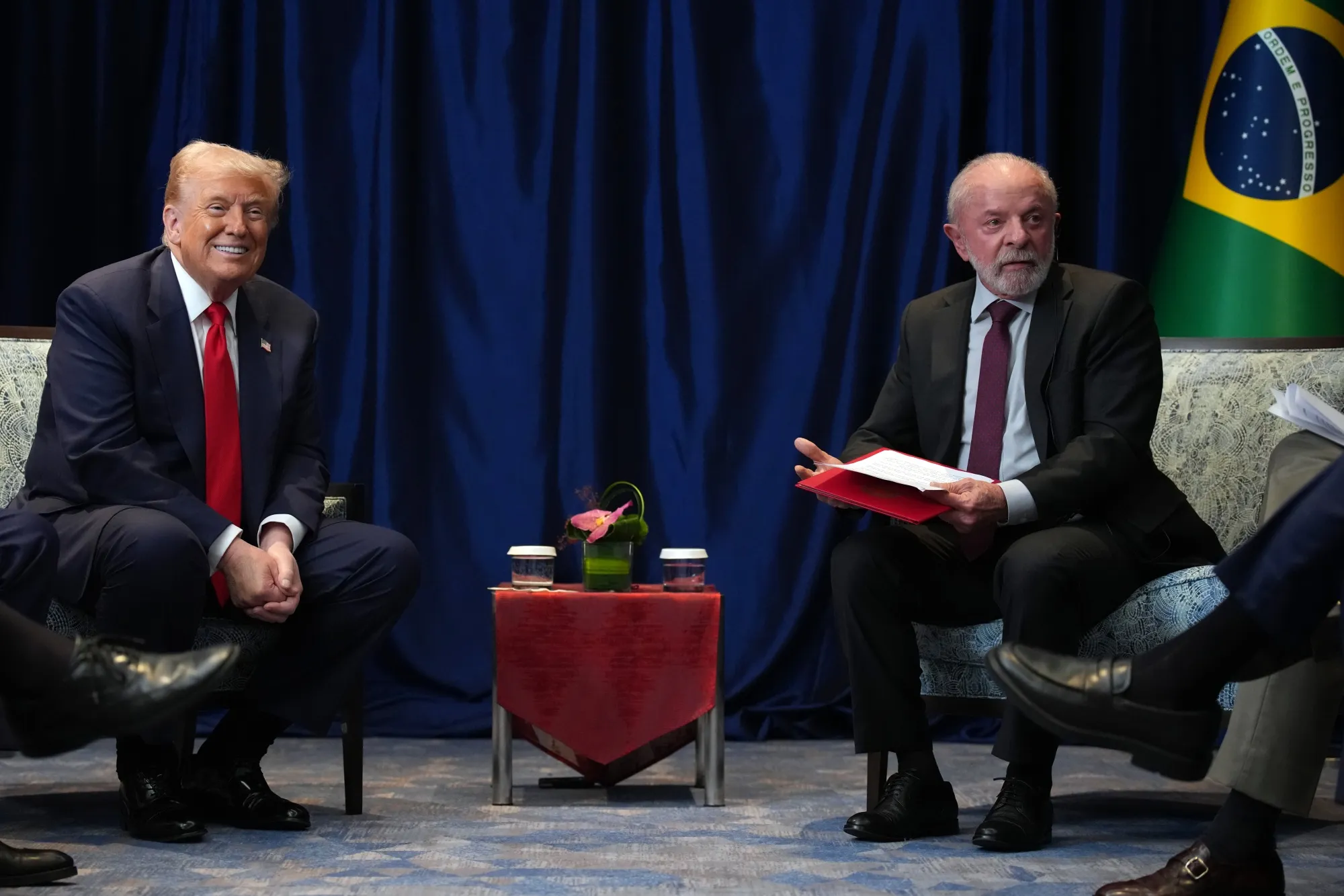 The guy on the left is holding all the cards.