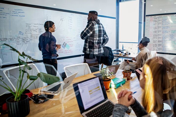 Employees at Lelapa AI, a company developing socially-grounded research to bolster artificial intelligence technology for African languages, in Johannesburg, July 9, 2024. (Cebisile Mbonani/The New York Times)
