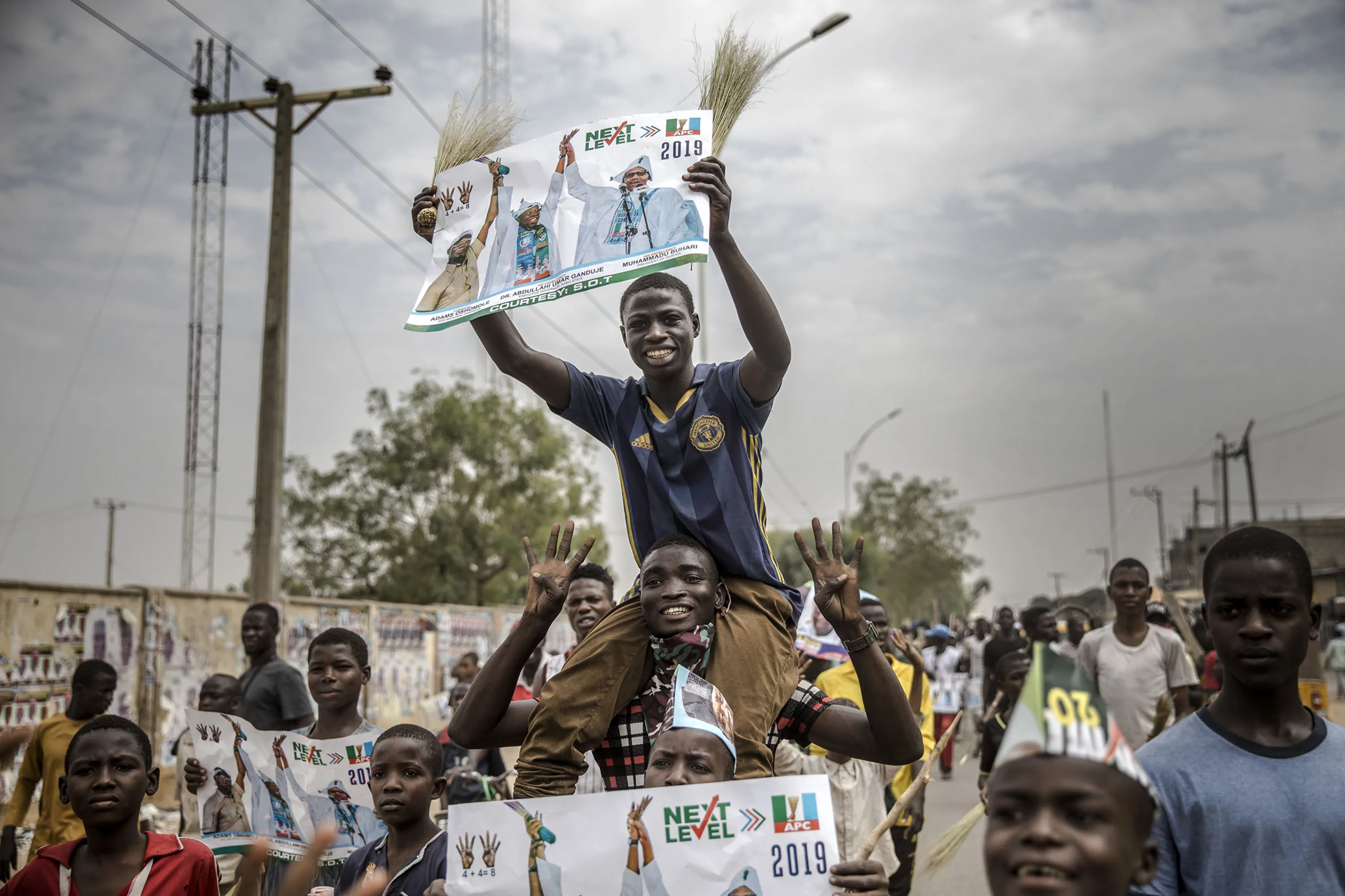 All Progressives Congress (APC) party supporters rally as they celebrate the re-election of Buhari.