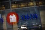 Bank of Montreal (BMO) signage is reflected on a surface in the financial district of Toronto, Ontario, Canada, on Thursday, July 25, 2019. 