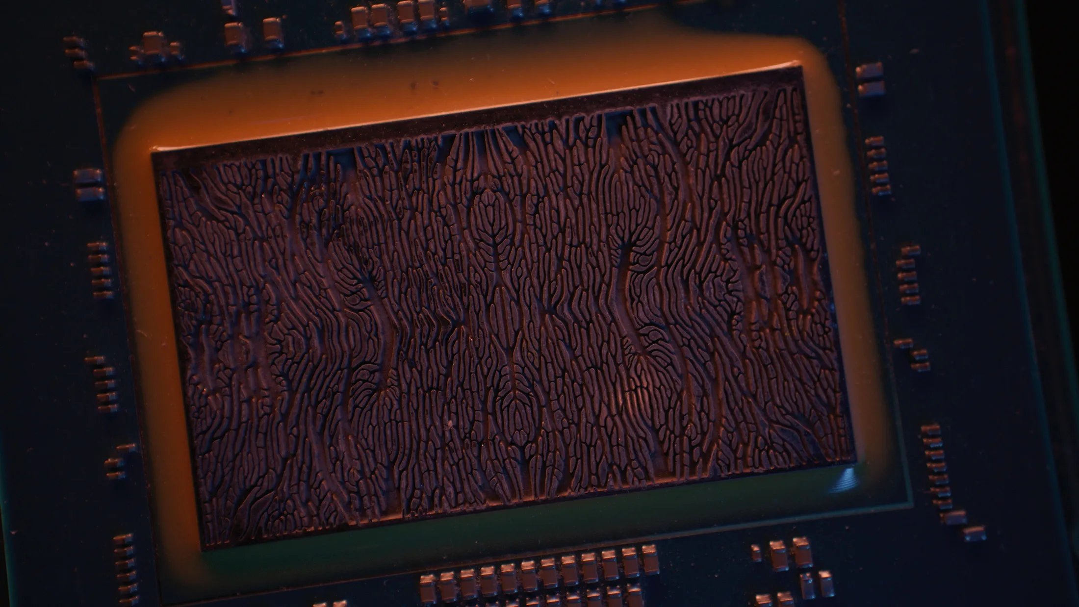 A chip cooled with microfluidic technology.