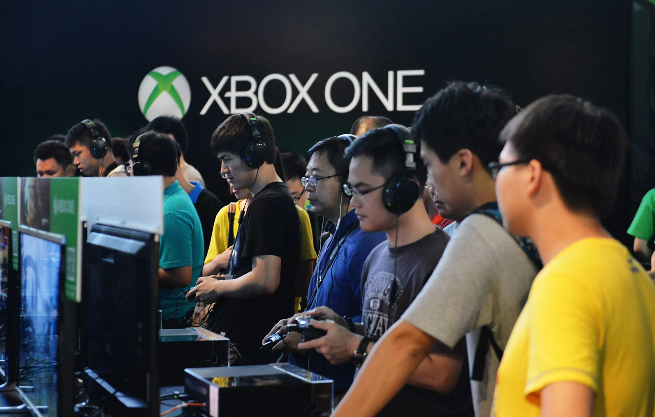 Gamers in Shanghai try the Xbox One during the China Joy event last year.
