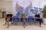 Israeli residents wait to receive a third dose of the Pfizer-BioNTech Covid-19 vaccine at a clinic in Tel Aviv, Israel, on Aug. 24.