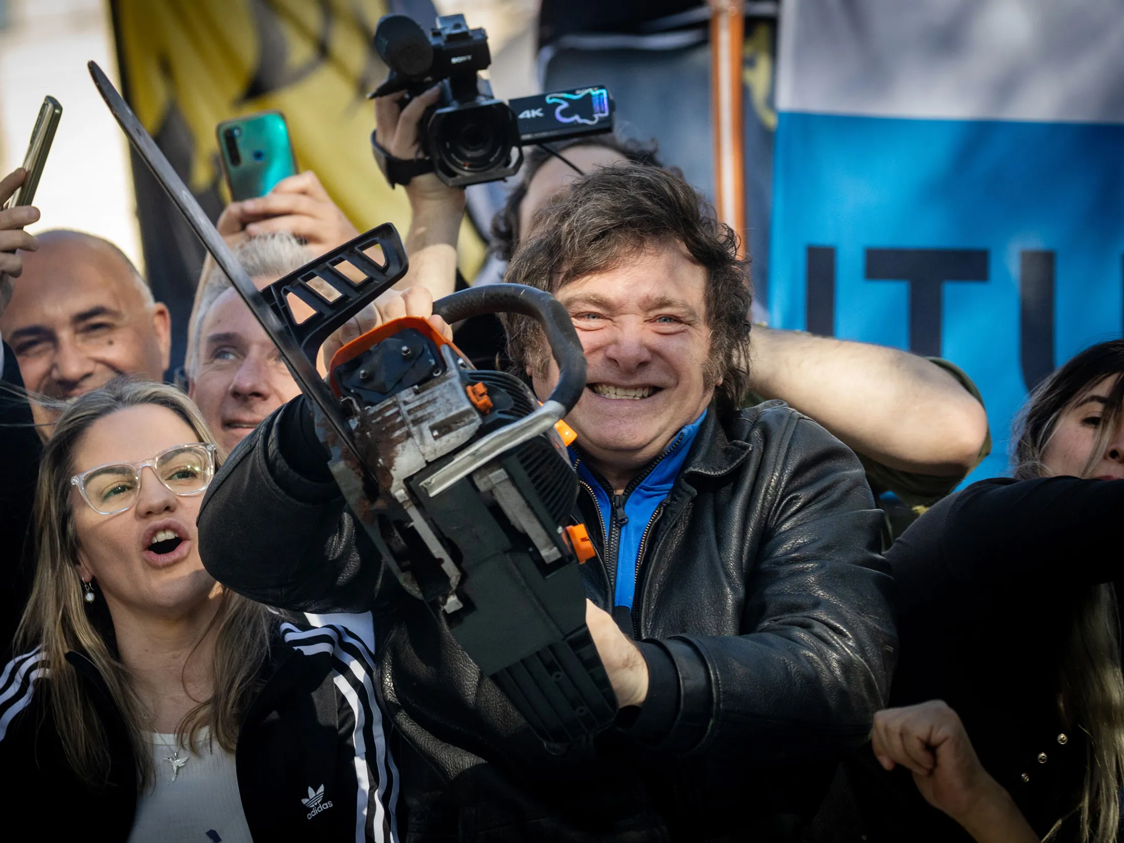 Javier Milei holds a chainsaw during a rally in Buenos Aires in 2023.