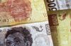 Mexican peso banknotes are arranged for a photograph in San Luis Potosi, Mexico, on Thursday, June 7, 2018. Nafta has been and will continue to be the main driver for the peso's performance, with no significant rebound on the horizon, HSBC strategist David Duong wrote in a note.