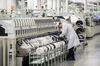 Employees work on a mobile phone assembly line at a Huawei Technologies Co. production base in Dongguan, China, on Wednesday, March 6, 2019. Huawei, China’s biggest smartphone maker, is using its financial and political clout to fight U.S. allegations that the company was involved in bank fraud, technology theft and spying