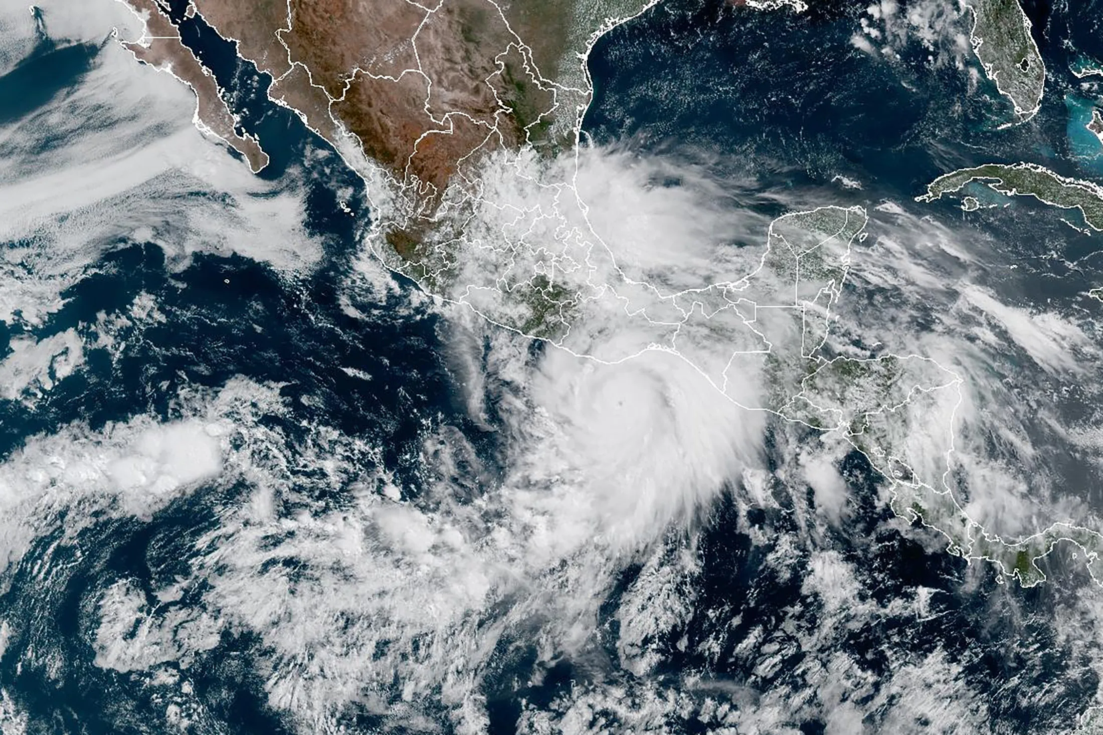 A satellite view of Hurricane Erick spinning off the Pacific Coast of Mexico on June 18.