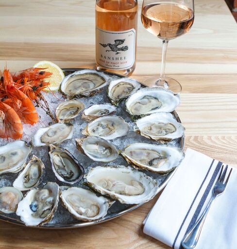 Select Oyster Bar features a sensational wine selection and local crudos, such as this raw plate.