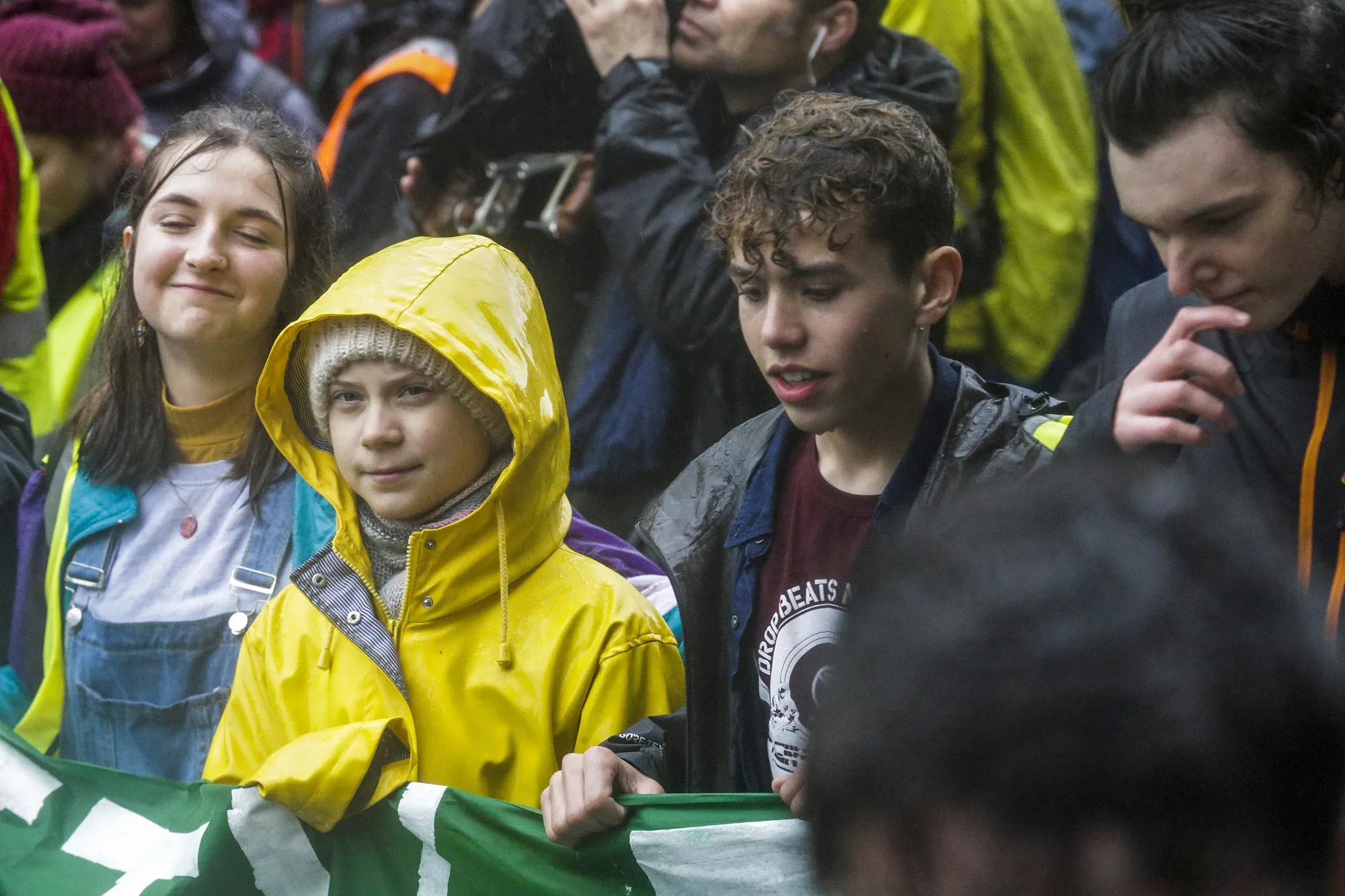 Greta Thunberg, second left, holds a banner during a march&nbsp;in Bristol, U.K., on&nbsp;Feb. 28.