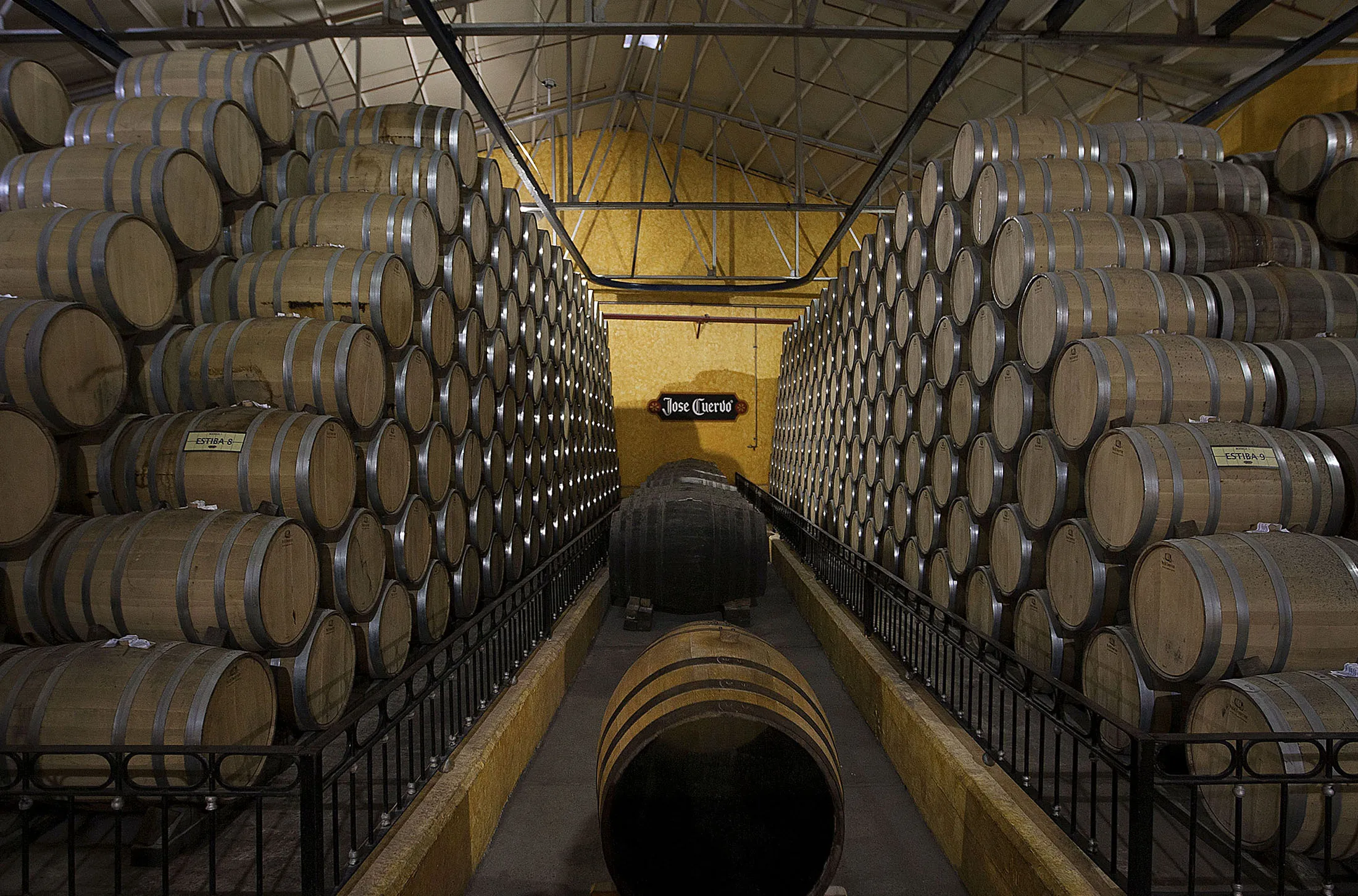 A view of the cellar tht contains hundreds of Tequila barrels inside the distillery plant at the Tequila Cuervo La Rojeña, S.A. de C.V in Tequila town in Guadalajada, Mexico on Thrusday, Nov.22 2012. Susana González /Bloomberg

