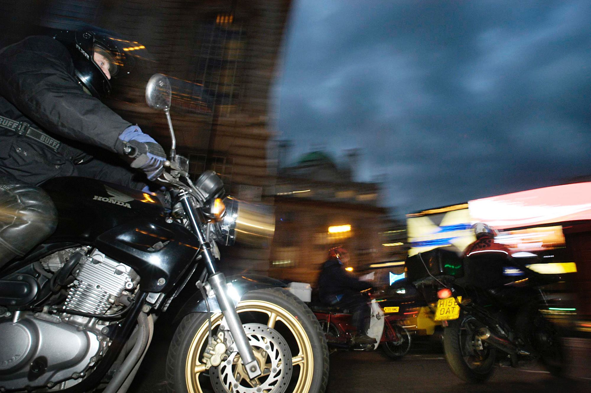 Motorcycle riders in rush hour traffic in Central London. The pandemic has helped boost the number of riders on the streets of cities around the world.&nbsp;&nbsp;