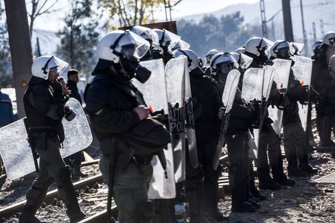 Greek police try to control the Greek-Macedonian border on Dec. 3