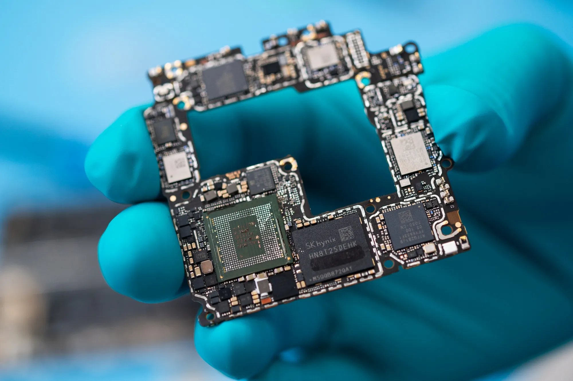 Components of a Huawei Technologies Co. Mate X5 smartphone, including a Kirin 9000s chip.