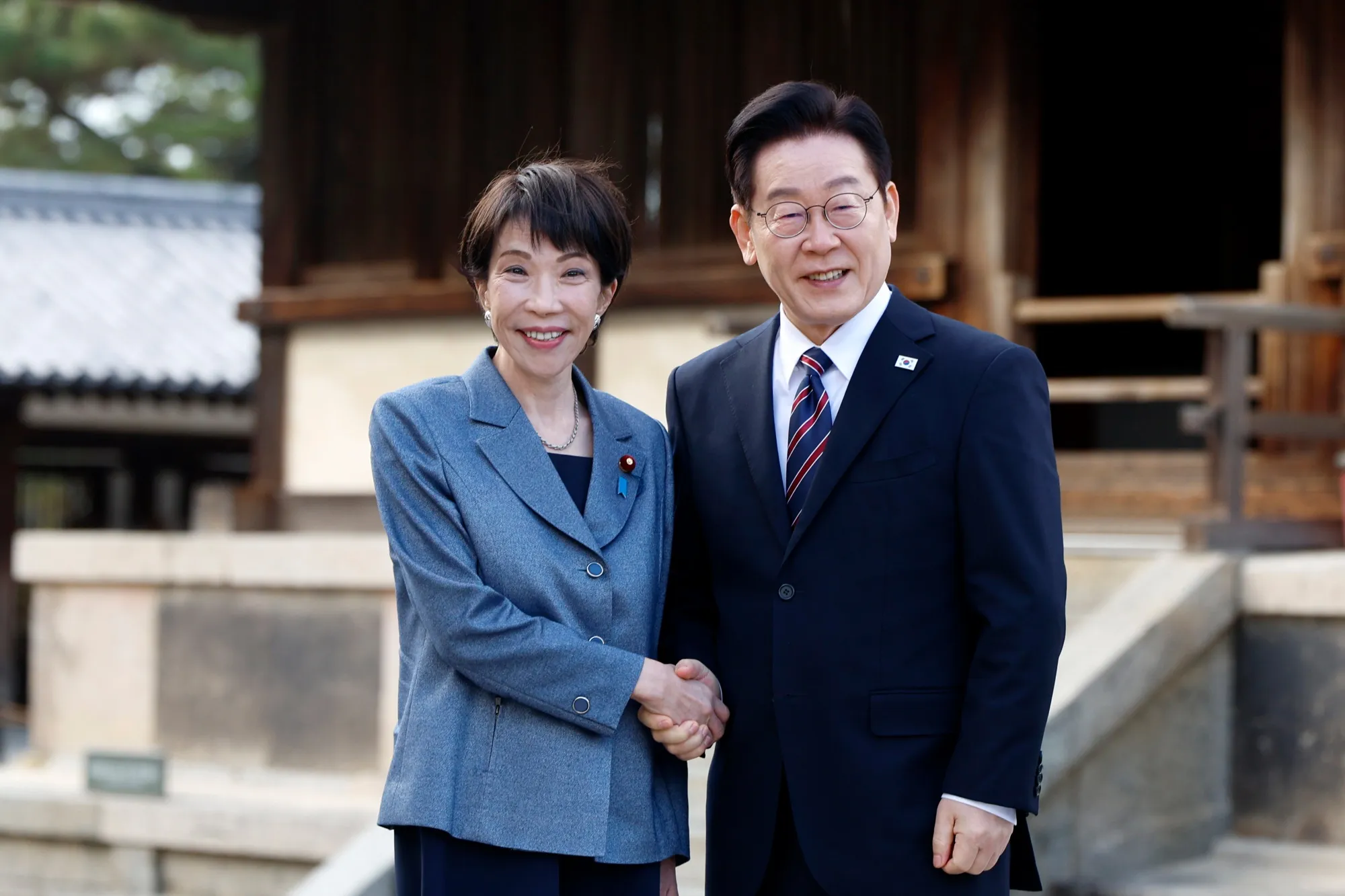 Sanae Takaichi, left, and Lee Jae Myung&nbsp;at the Horyu-ji temple in Ikaruga, Nara Prefecture, Japan, in January.