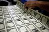 A 50 subject one dollar note sheet is inspected after being printed with an intaglio printing press at the U.S. Bureau of Engraving and Printing in Washington, D.C., U.S., on Tuesday, April 14, 2015. Republican efforts to pass a fiscal year 2016 budget cleared another hurdle as the House named its members to a conference committee and Senate Majority Leader Mitch McConnell pledged to do the same by the end of the week.