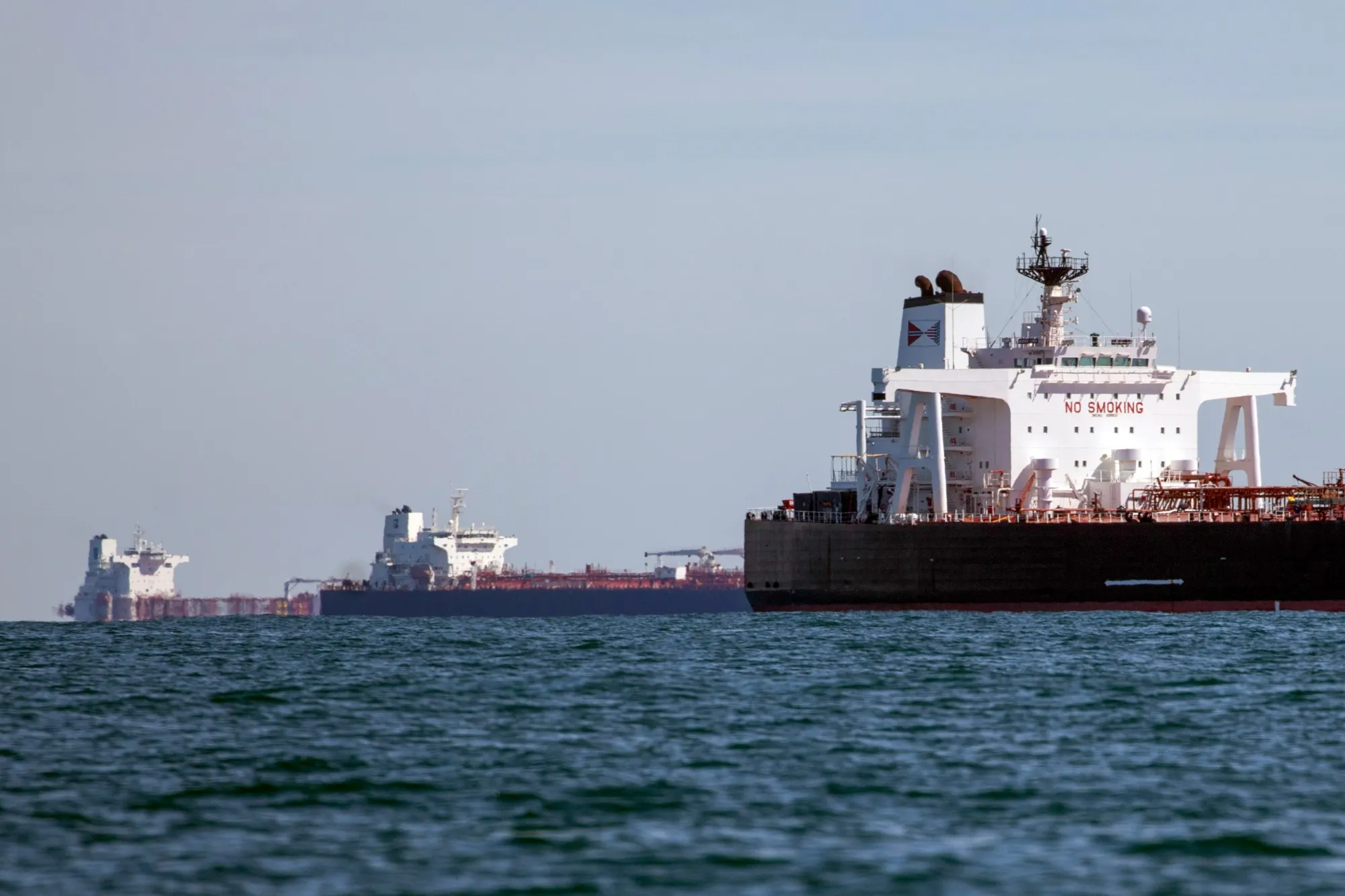 A Suezmax crude oil tanker, right.