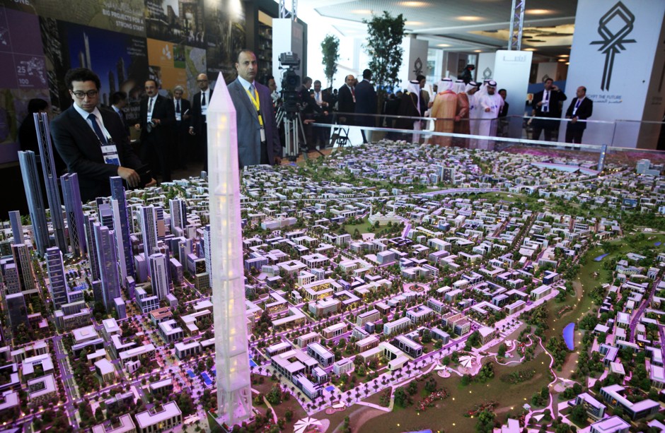 Potential investors peruse a model of Egypt's new capital.
