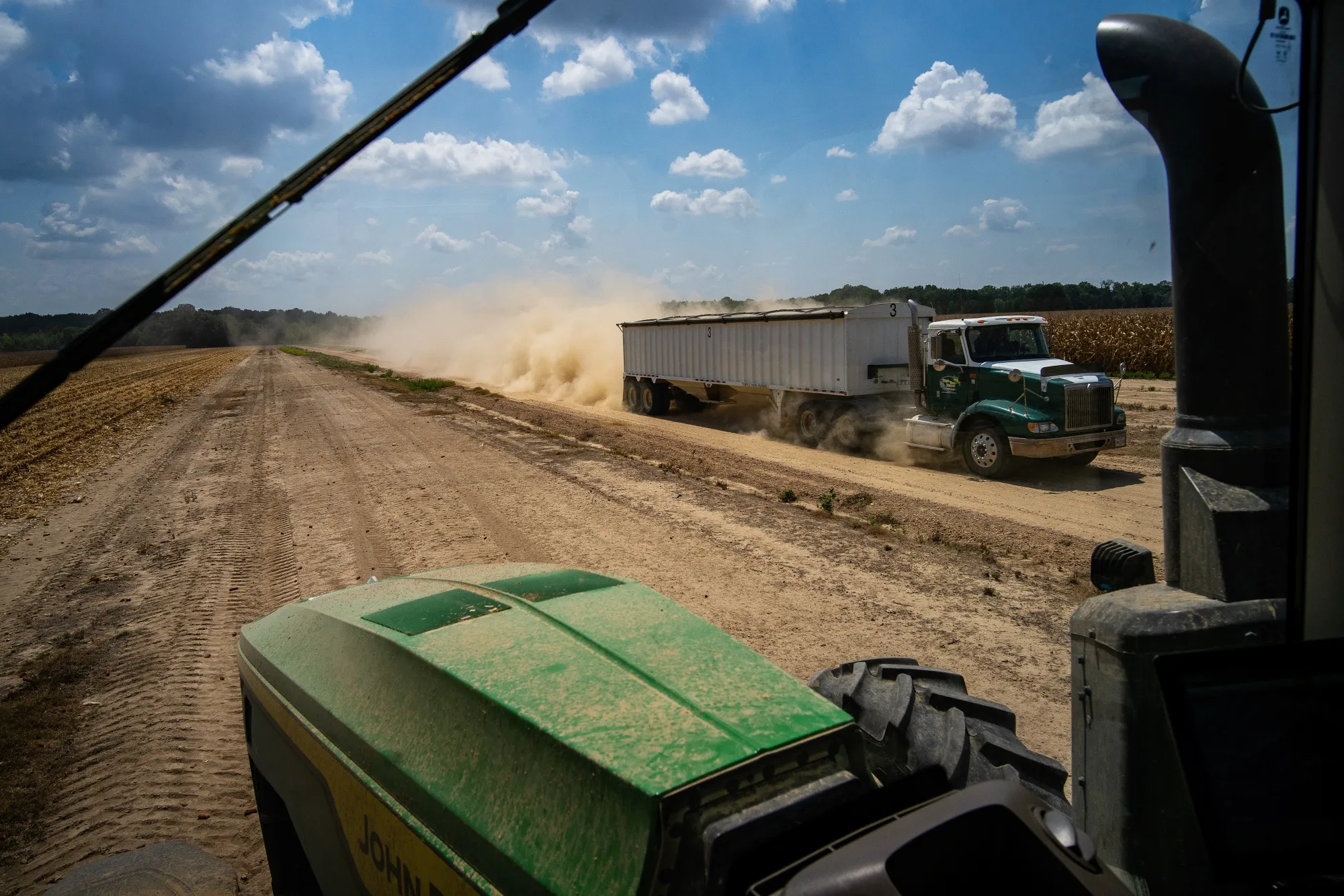A truck loaded with corn departs a farm in Dockery, Mississippi.