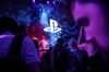 The Sony Corp. Playstation logo is displayed as attendees gather for the company's event ahead of the E3 Electronic Entertainment Expo in Los Angeles, California, U.S., on Monday, June 11, 2018. Sony corralled attendees through different venues as they put their new titles on display, including a remastered version of cult favorite Resident Evil 2 and their event finale Spider-Man.
