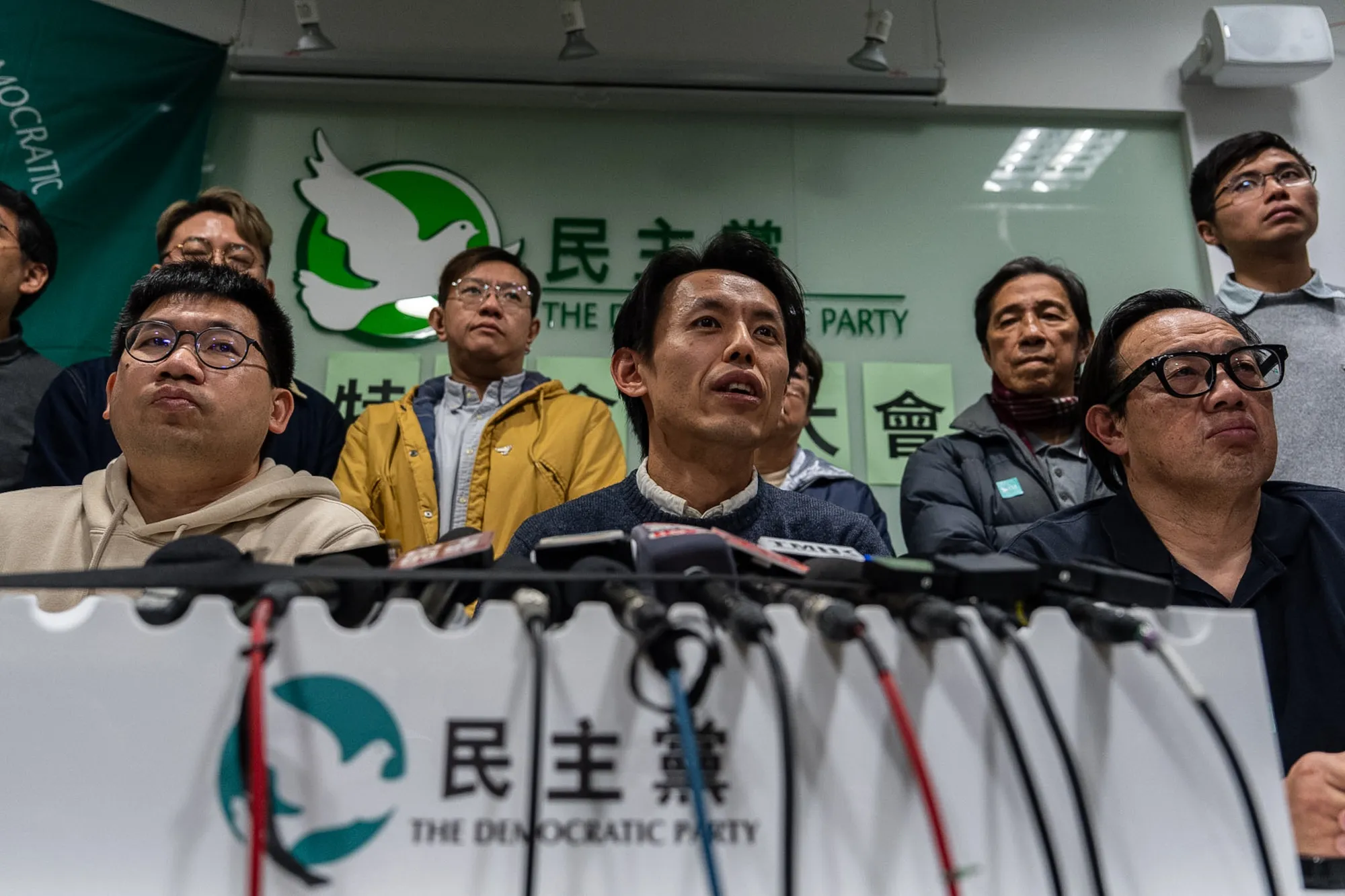 Lo Kin-hei, chairman of Hong Kong's Democratic Party, center, at a news conference at the office of Hong Kong's Democratic Party in Hong Kong on, Dec. 14.