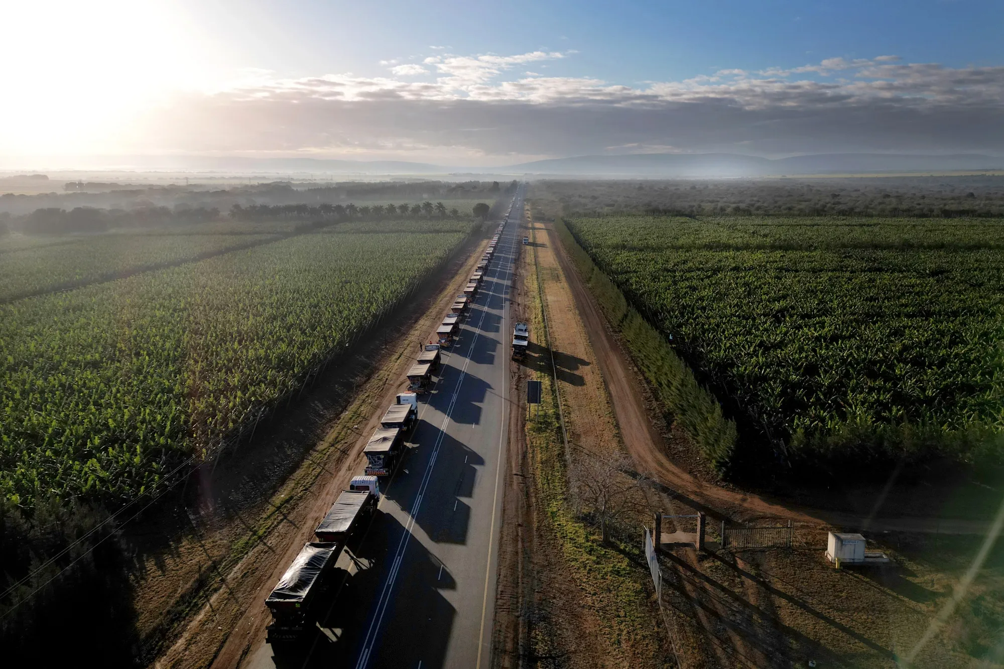 Trucks wait to cross South Africa’s border into Mozambique at Lebombo Border control in Komatipoort, on&nbsp;July 14.