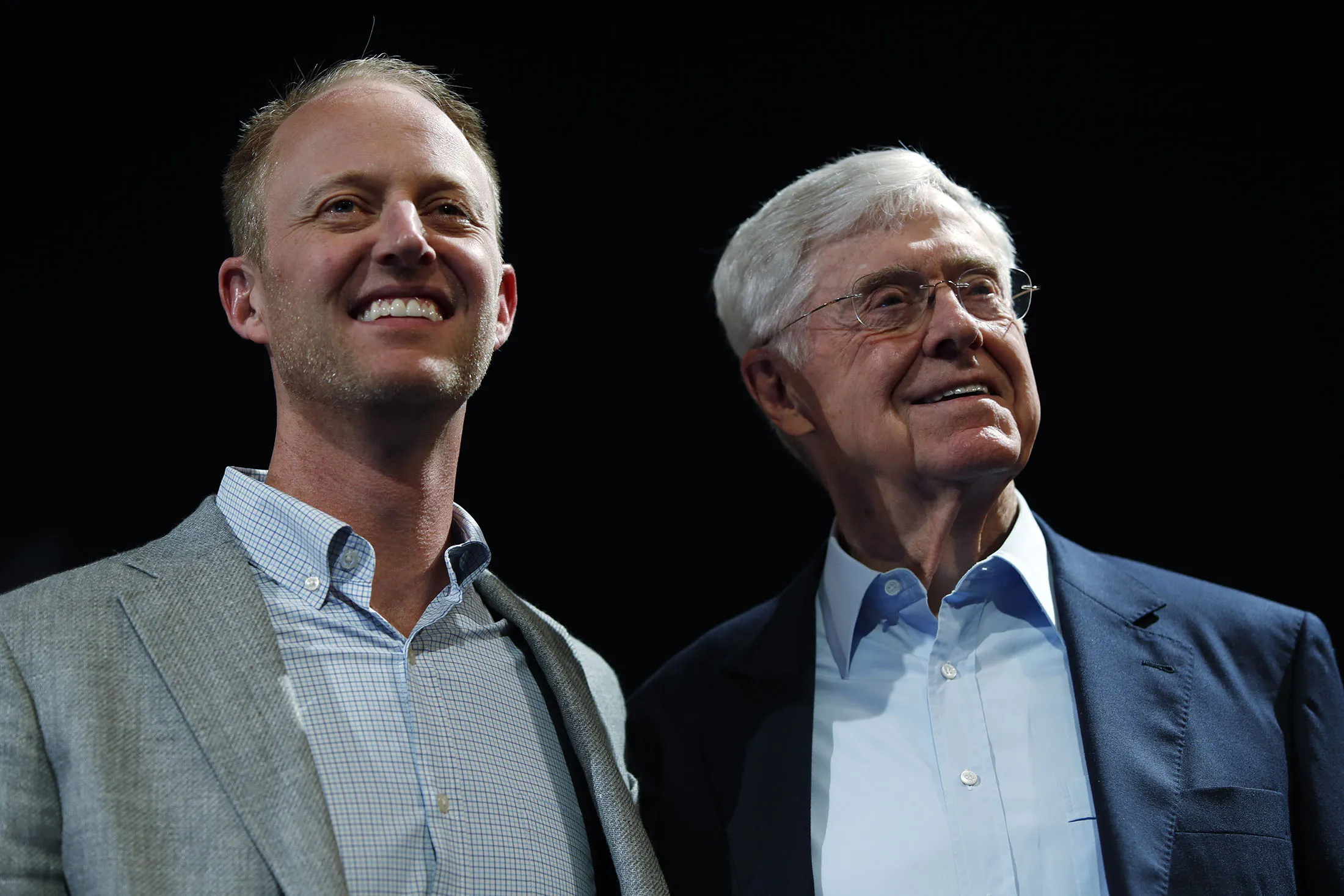 Charles Koch, right, and his son, Chase Koch