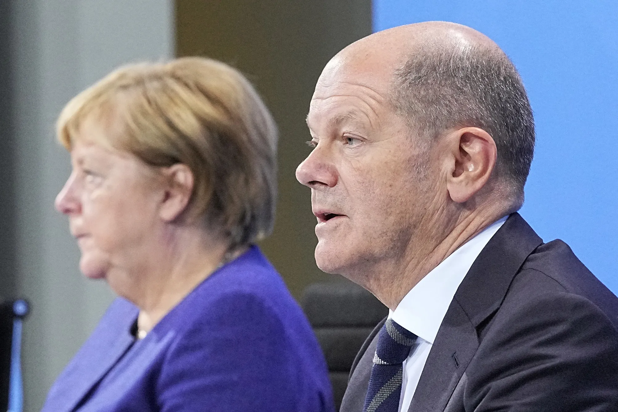 Angela Merkel, left, and Olaf Scholz.