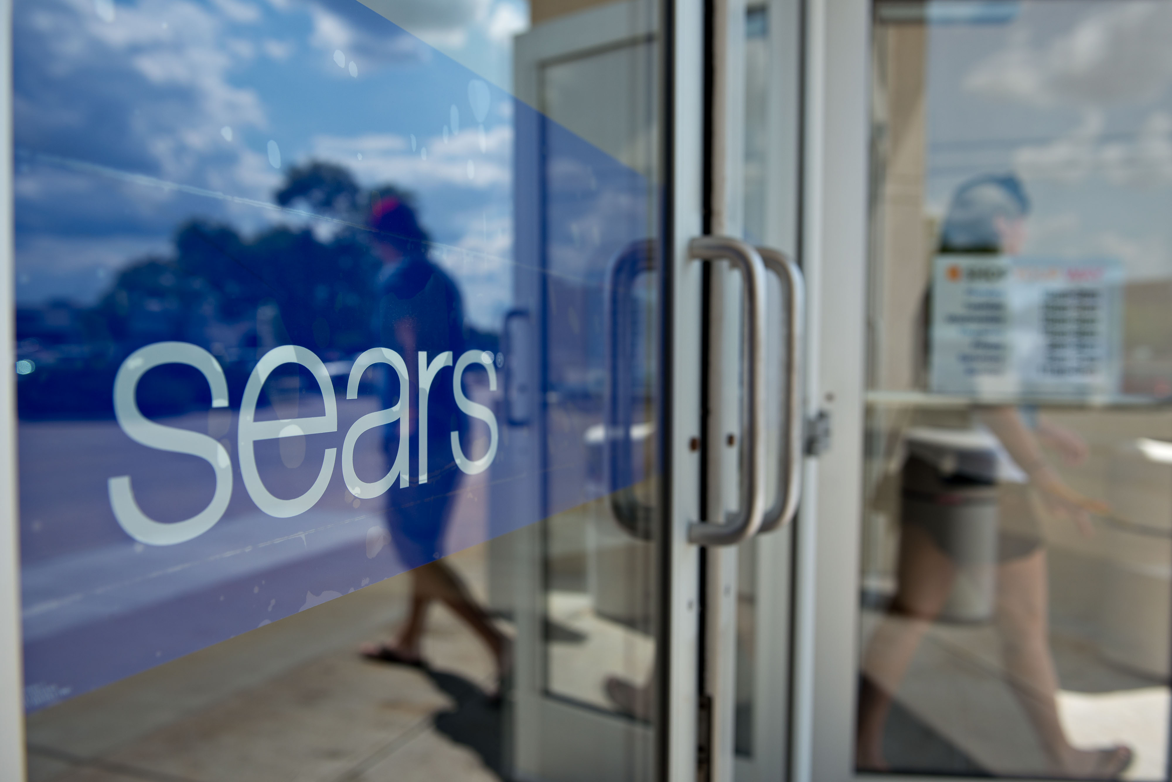 A shopper exits a Sears store in Peoria, Illinois.