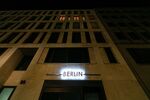 A partially lit office building in central Berlin.