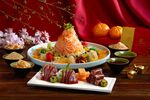 Yu sheng, the&nbsp;celebratory fish salad that’s a Lunar New Year staple, with tuna sashimi and Ibérico ham at Raffles.&nbsp;