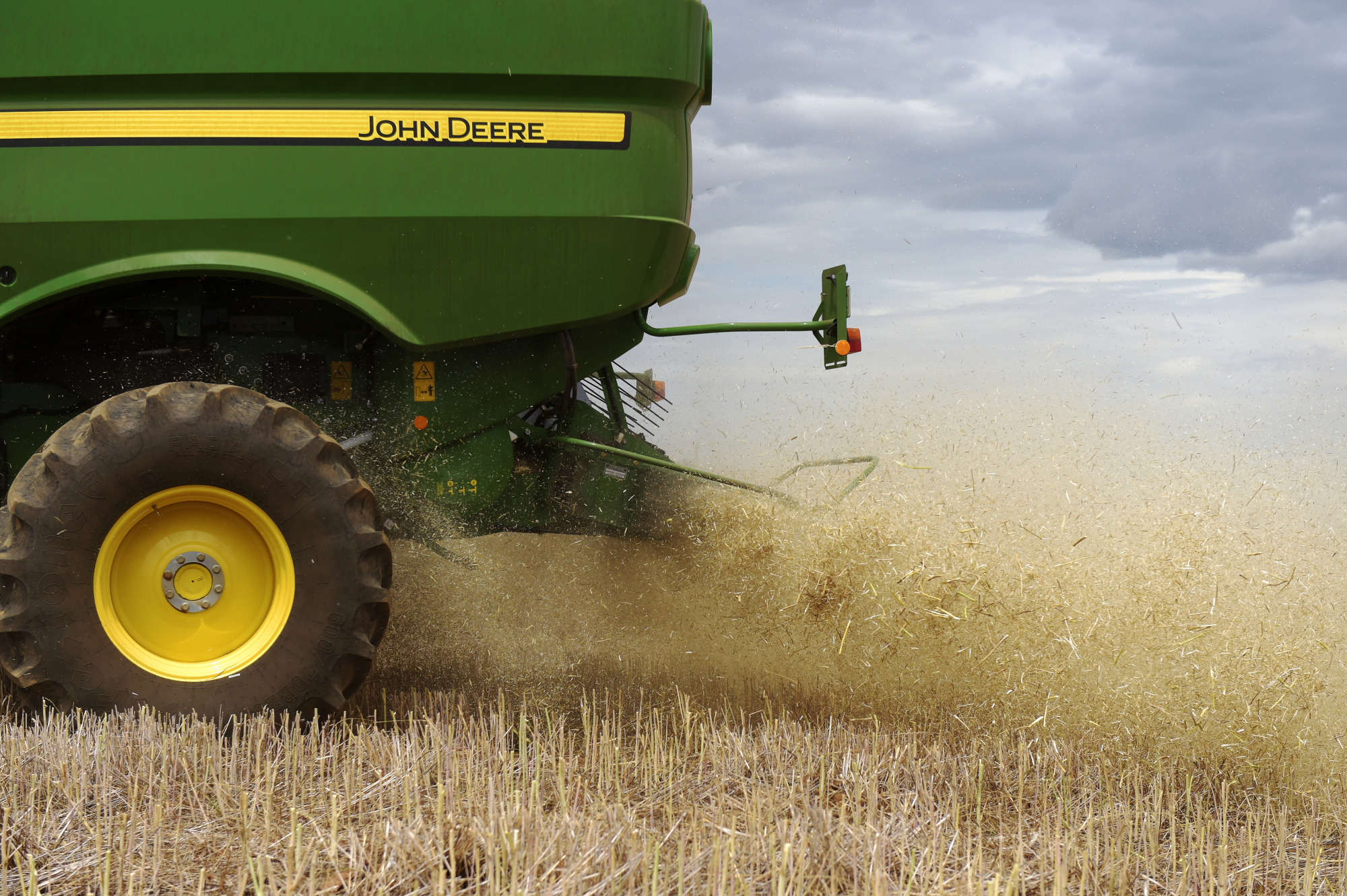 Deere Shares Tumble After the Farm Equipment Maker's 2024 Guidance Misses  Estimates