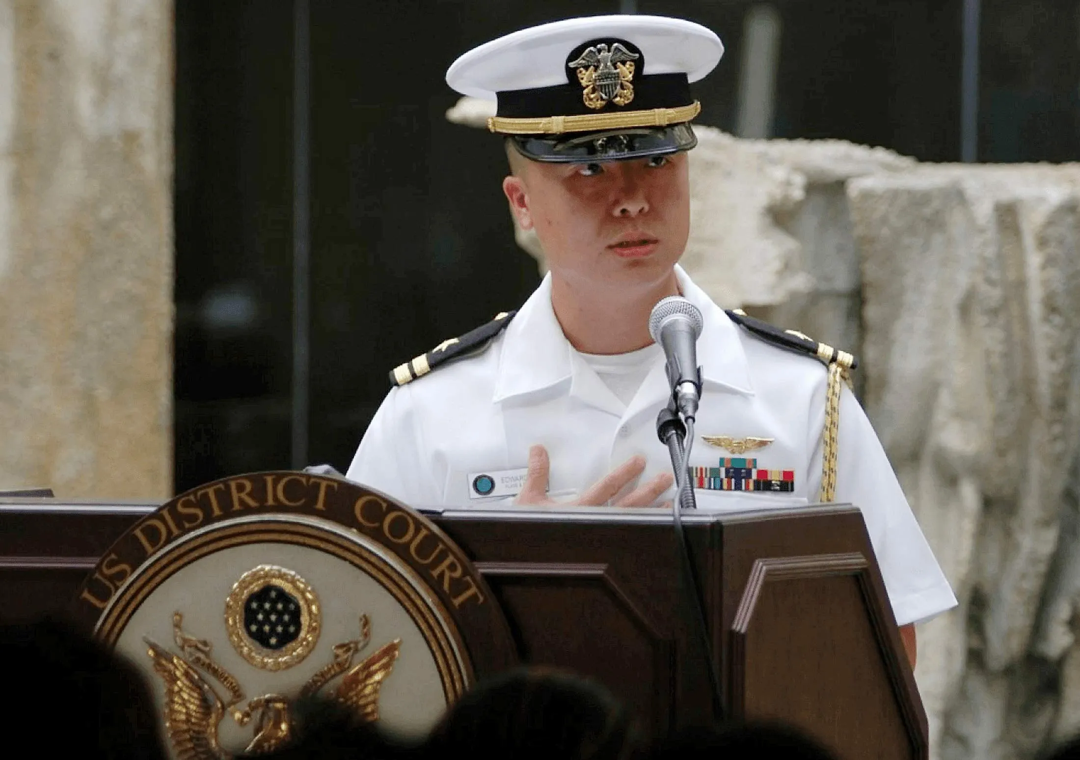 In this 2008, photo released by the U.S. Navy, Lt. Edward Lin, speaks in the U.S.
