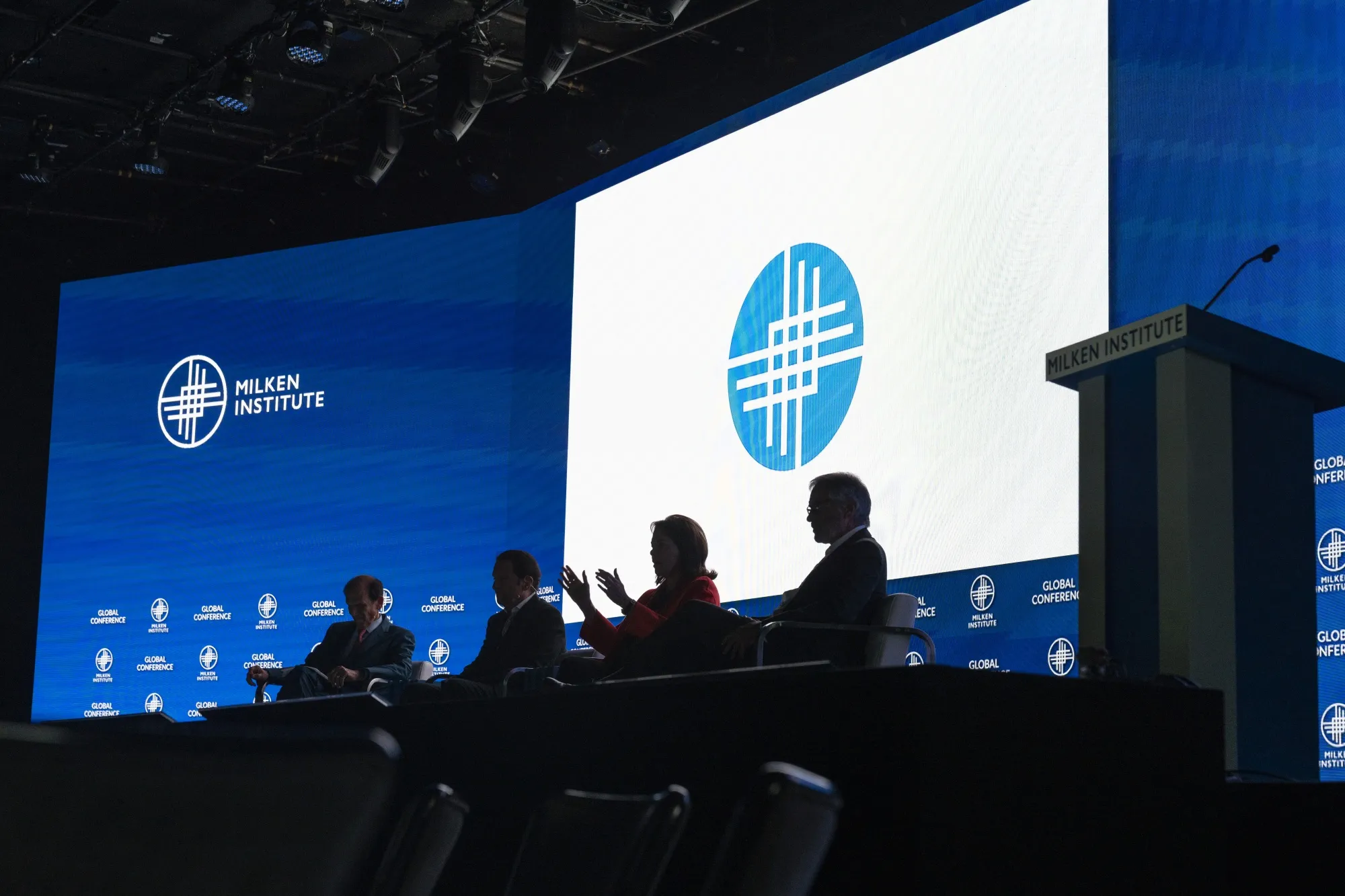Speakers participate in a panel discussion during the Milken Institute Global Conference in Beverly Hills in 2022.