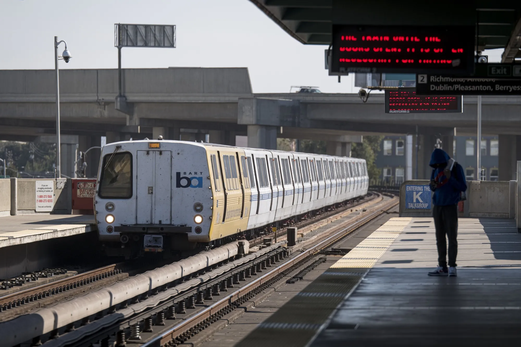 A person waits on a platform at a Bay Area Rapid Transit (BART) train station in Oakland, California, U.S., on Monday, Oct. 26, 2020.