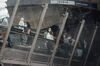 Morning rush hour commuters wear protective face masks while riding escalators at Gare Saint-Lazare railway station in Paris, France.
