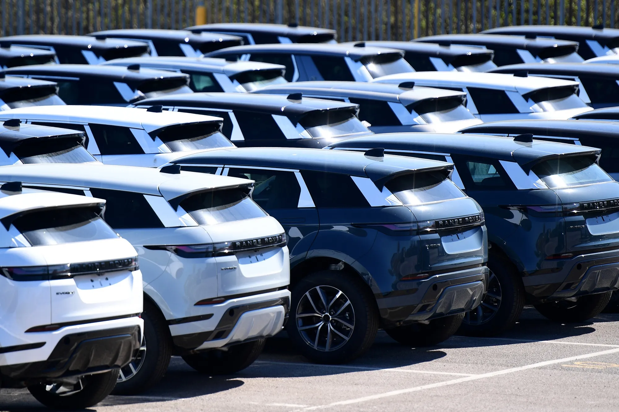 Land Rover cars outside the Jaguar Land Rover factory in Halewood, UK.