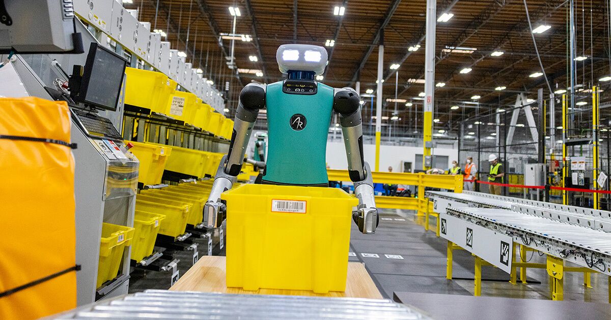 Amazon Warehouses Provide Glimpse of Workplace Humanoid Robots Bloomberg