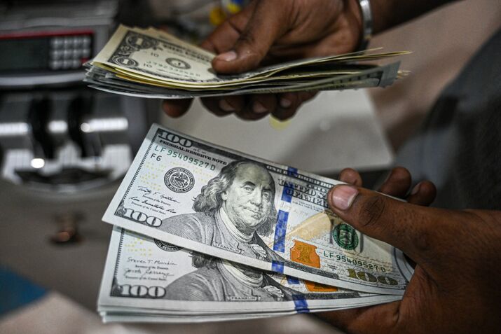 Currency Exchanges in New Delhi as Indian Rupee Falls to Record on Worries About US Tariff Impact