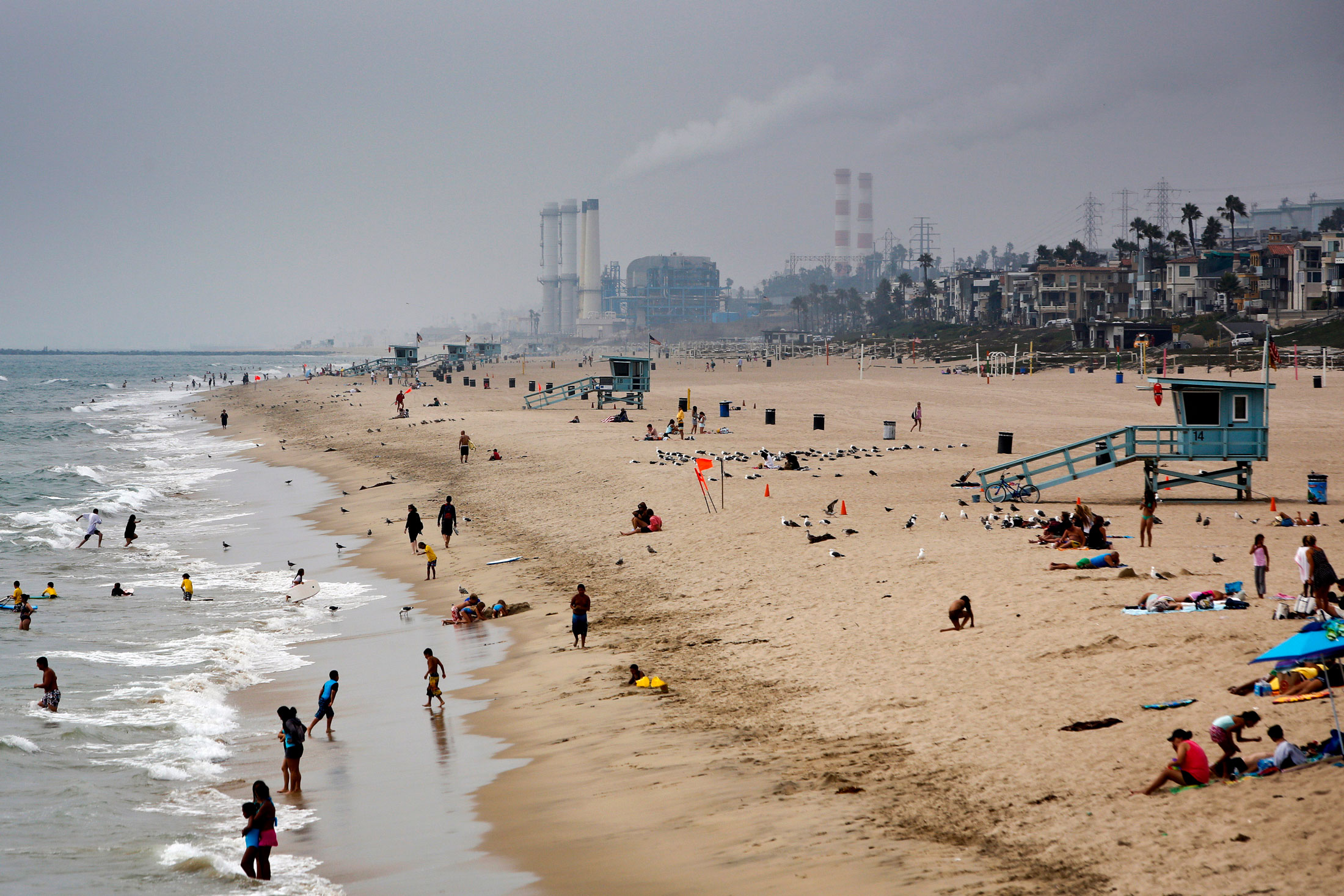 Manhattan Beach, Calif., with Chevron’s El Segundo refinery in the background.
